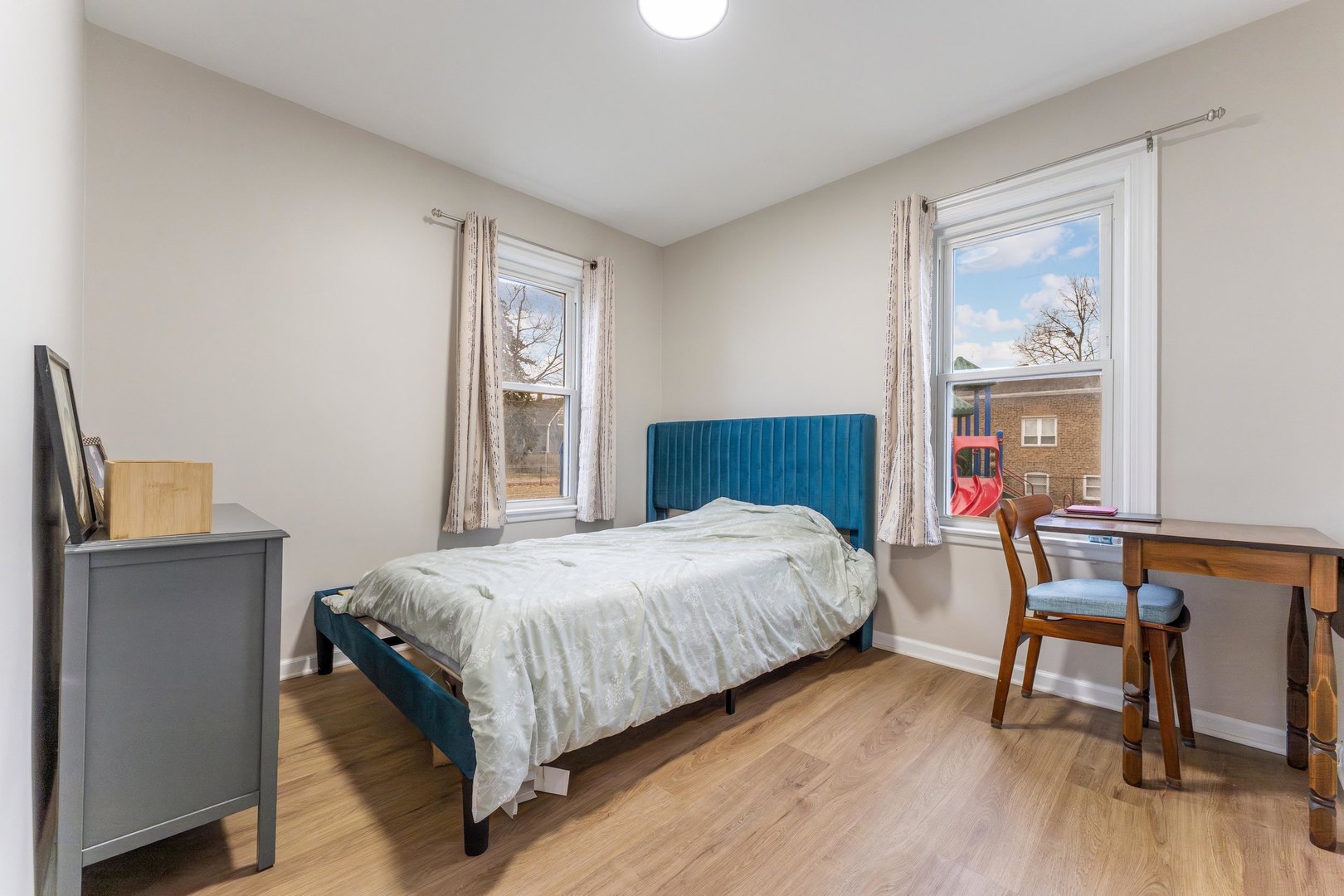 3227 Harrison Avenue Brookfield, IL 60513 - Photo 9 of 21 a bedroom with a bed and a desk