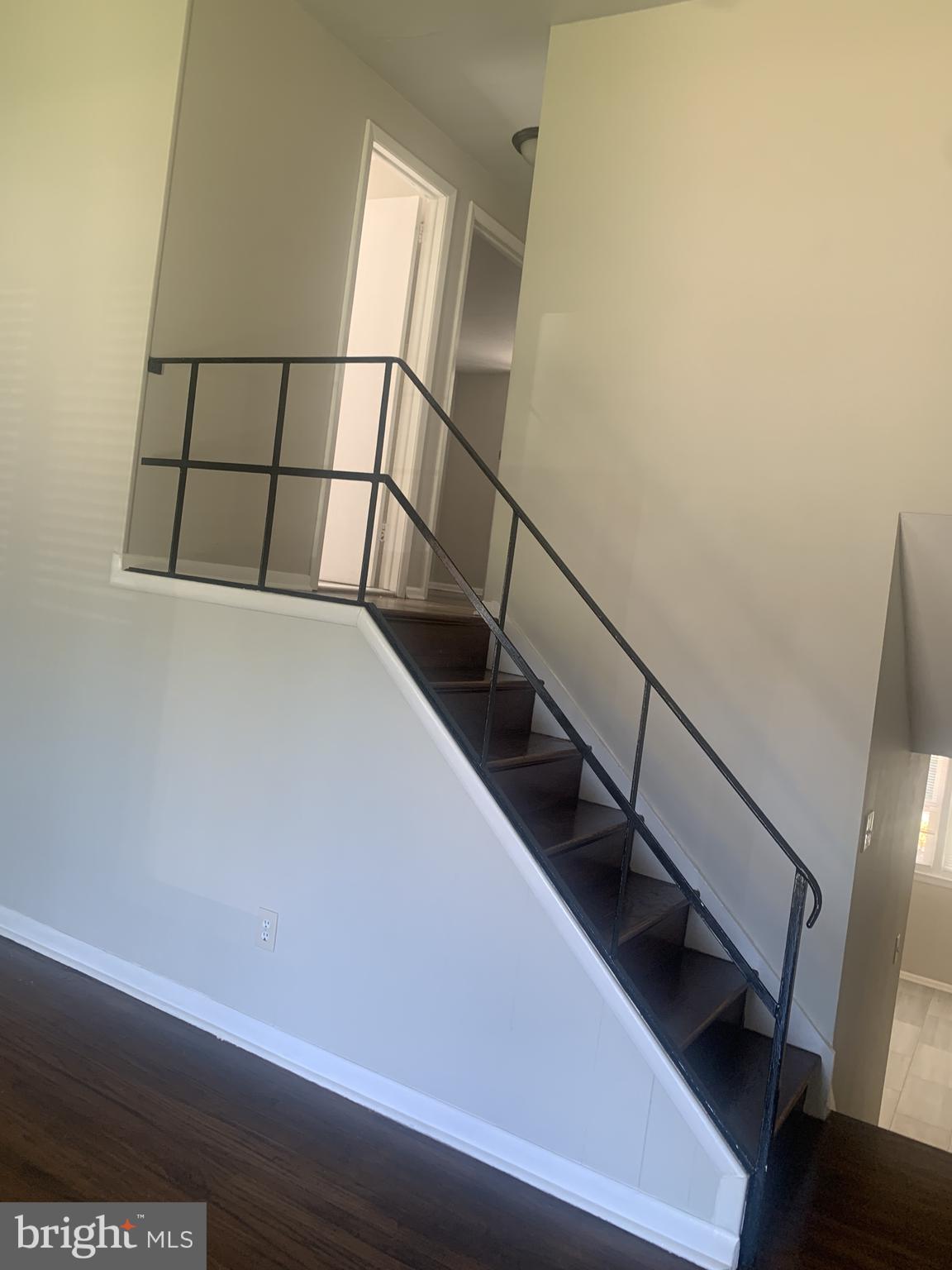 163 Wiltshire Road Claymont, DE 19703 - Photo 21 of 32 Heading to the upper level from the living room