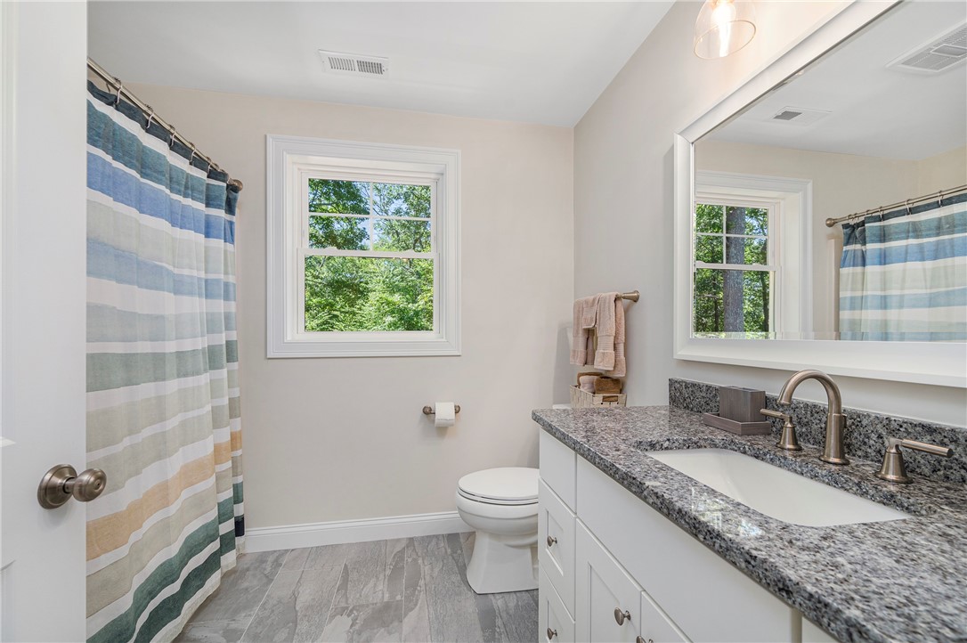 936 S Road East Greenwich, RI 02818 - Photo 23 of 31 Full bathroom with granite vanity and a tub/shower