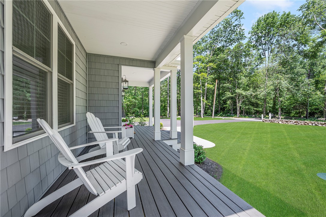 936 S Road East Greenwich, RI 02818 - Photo 3 of 31 Low maintenance shingles, vinyl clapboard siding and composite front porch