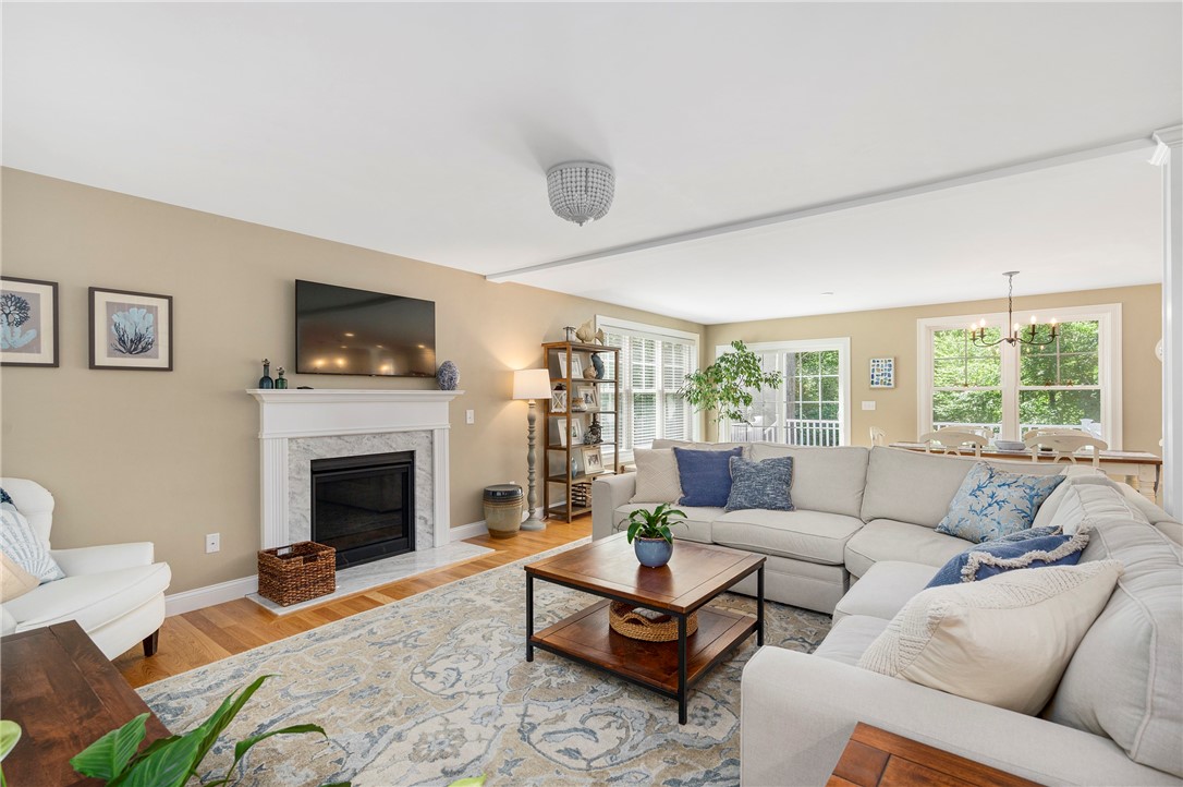 936 S Road East Greenwich, RI 02818 - Photo 4 of 31 Living room with gas fireplace and quartzite surround