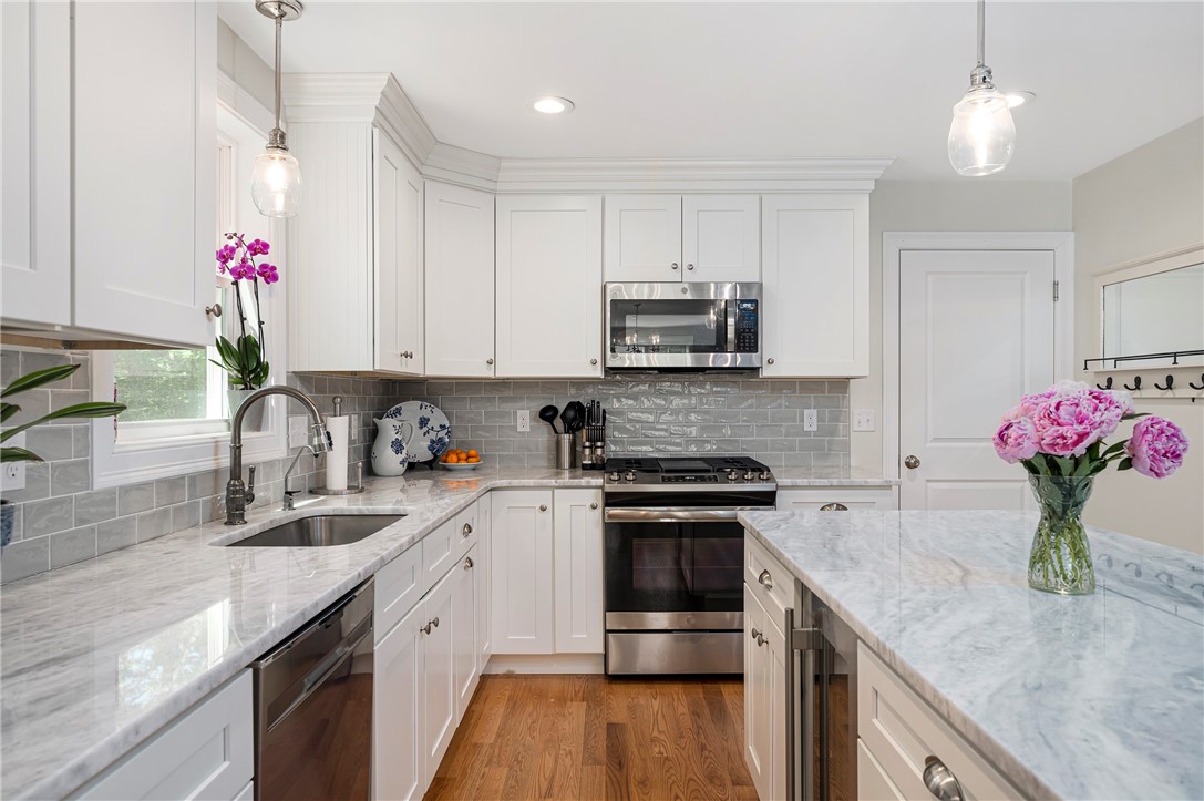 936 S Road East Greenwich, RI 02818 - Photo 10 of 31 It comes with it's own wine/beverage refrigerator in the island
