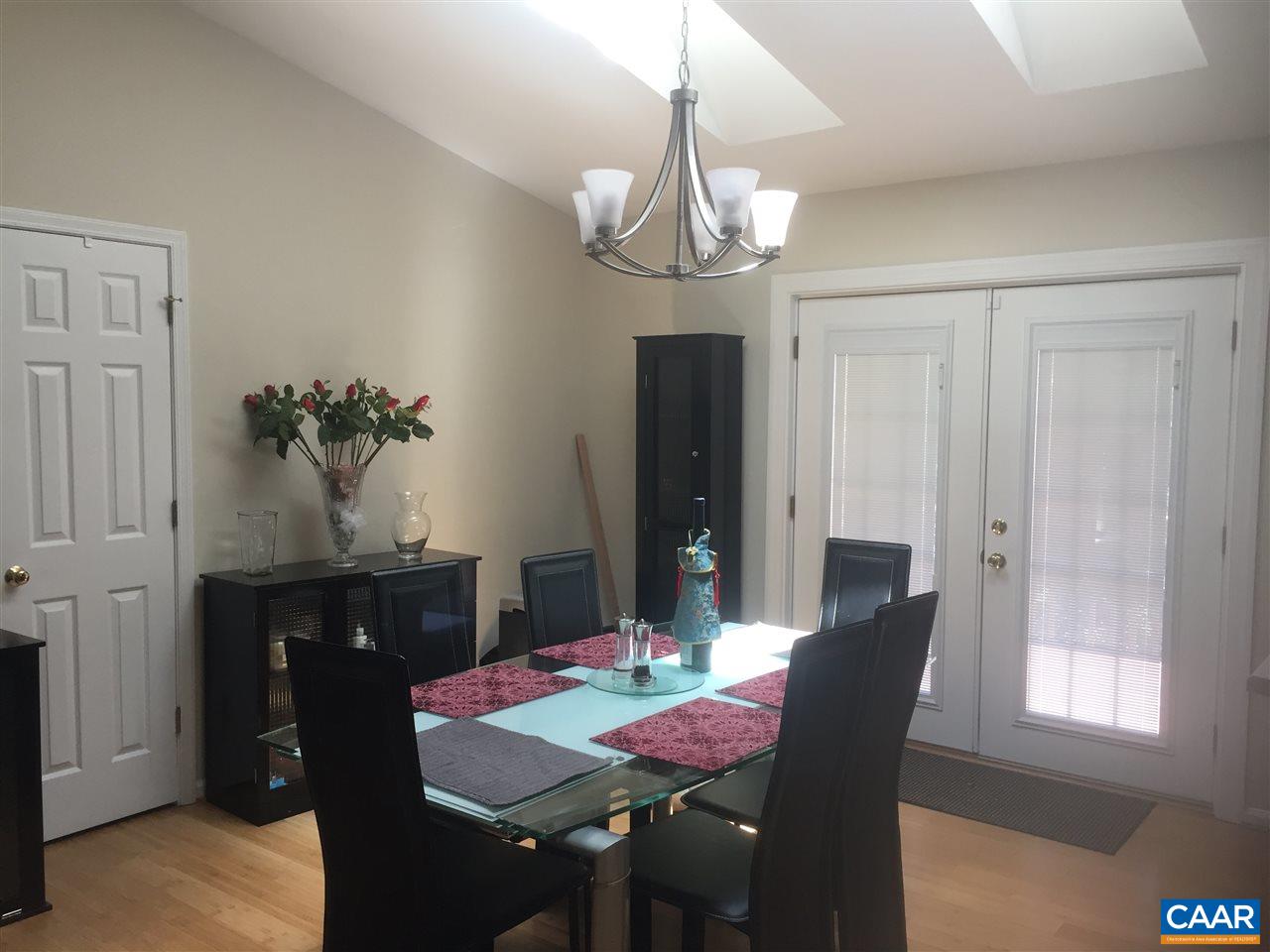 182 Stephens Loop Ruckersville, VA 22968 - Photo 3 of 14 a view of a dining room with furniture