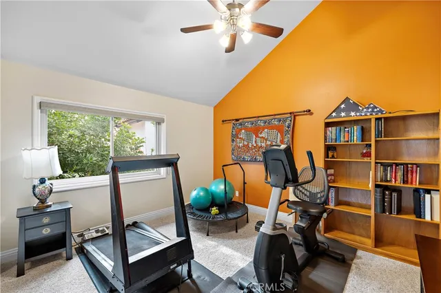 a room with gym equipment and a window