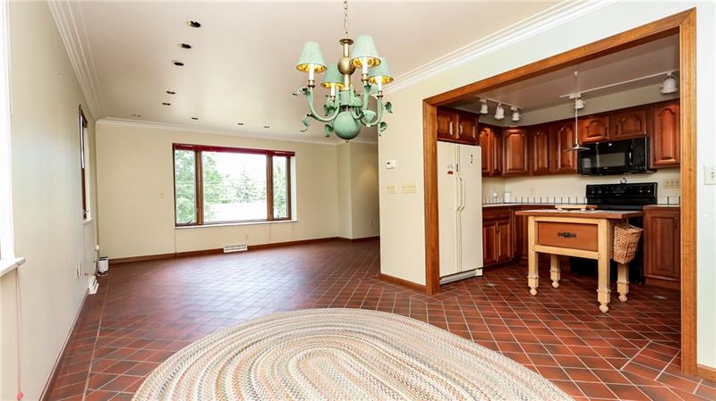 29 Swallow Hill Road Carnegie, PA 15106 - Photo 12 of 25 Open concept kitchen/dining areas. Island is portable and can be moved.