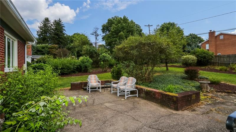 29 Swallow Hill Road Carnegie, PA 15106 - Photo 3 of 25 Rear patio with many areas to sit and enjoy the gorgeous gardens.
