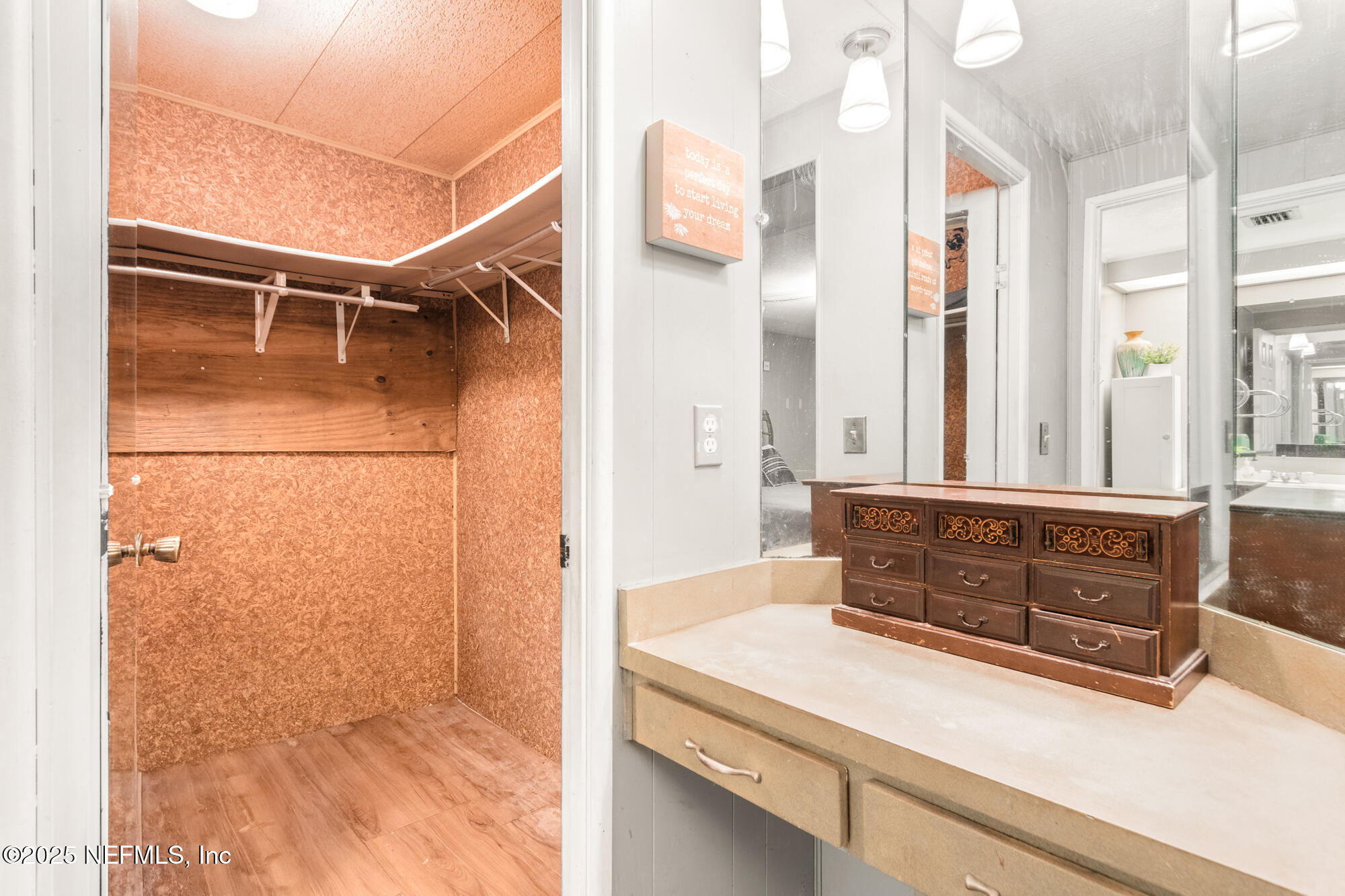 106 Deltona Boulevard St. Augustine, FL 32086 - Photo 11 of 36 a bathroom with a tub shower vanity and a sink