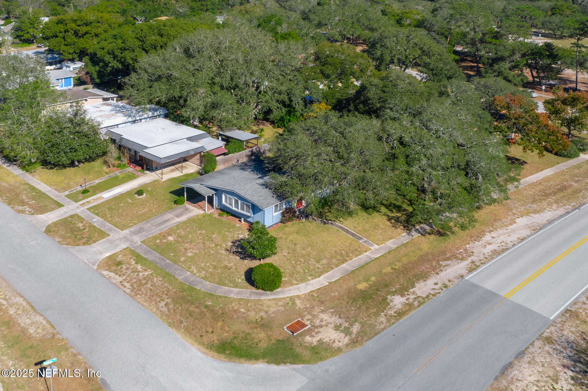 106 Deltona Boulevard St. Augustine, FL 32086 - Photo 33 of 36 an aerial view of a house with outdoor space