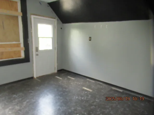 an empty room with a window