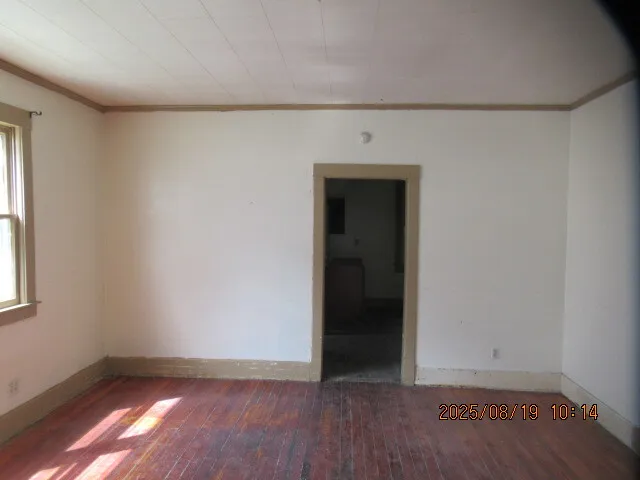 a view of empty room with closet
