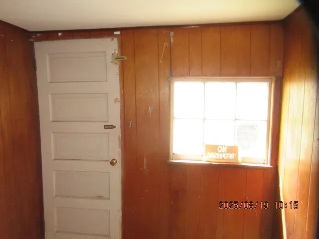 a view of a room with rack on the wall