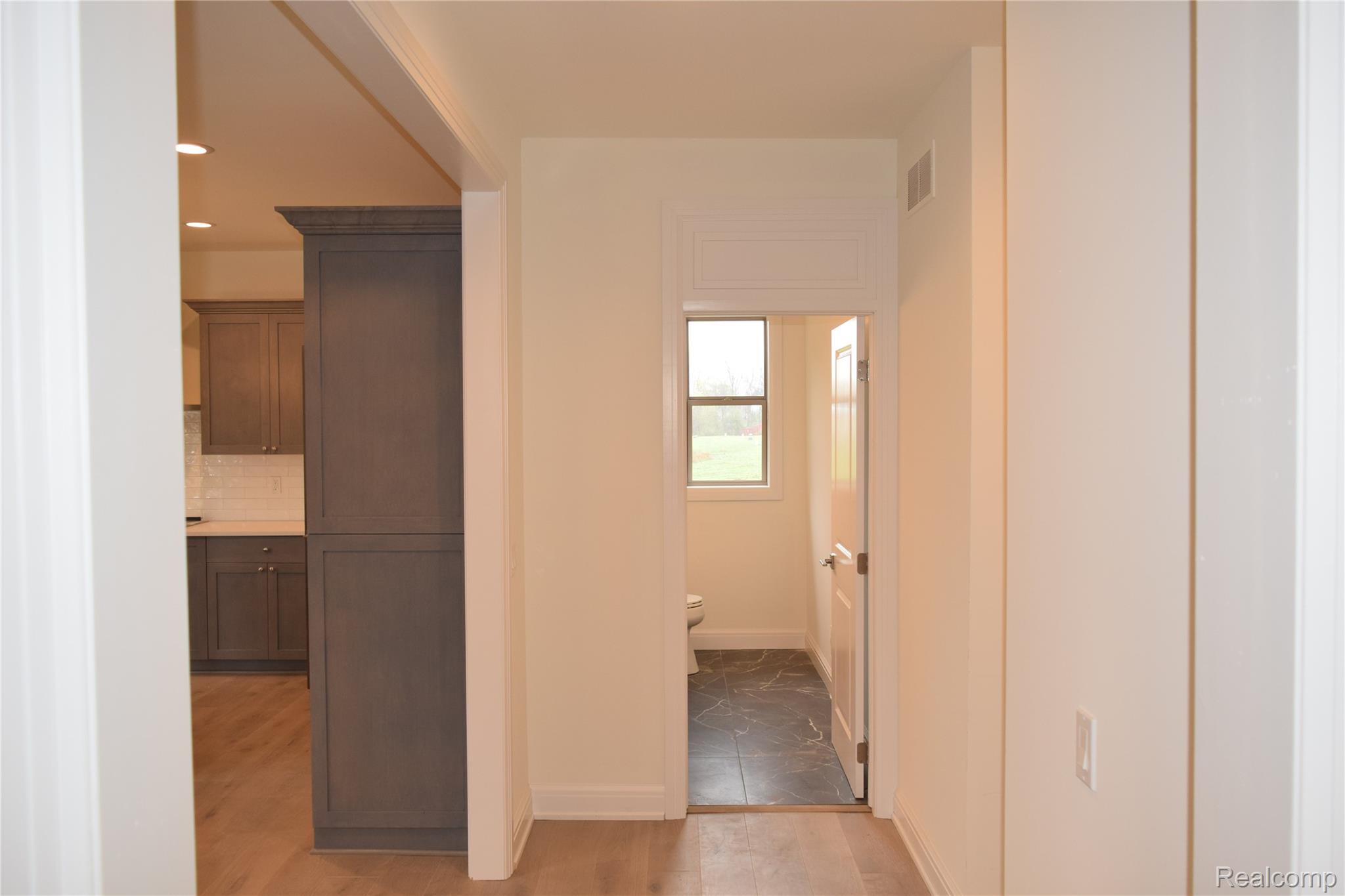 3093 Raffler Drive Rochester, MI 48307 - Photo 21 of 34 Hall featuring baseboards and recessed lighting