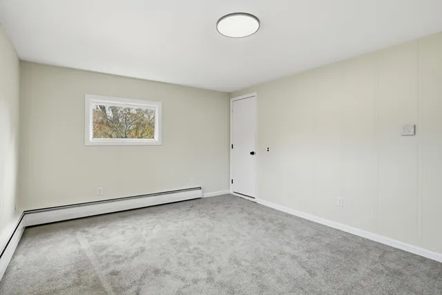 an empty room with a workbench