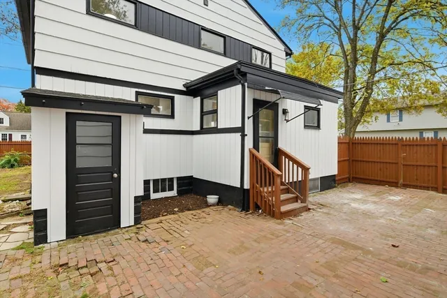 a house view with a backyard space