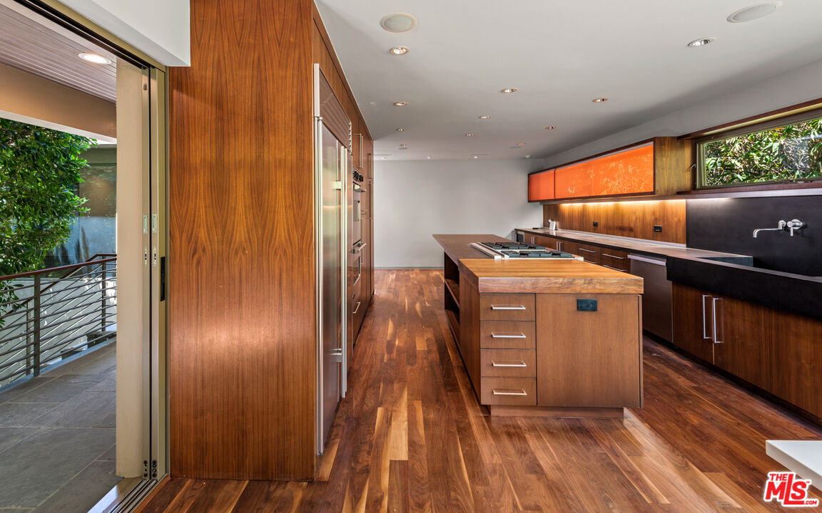 Undisclosed Address Los Angeles, CA 90068 - Photo 11 of 30 a view of a hallway with wooden floor