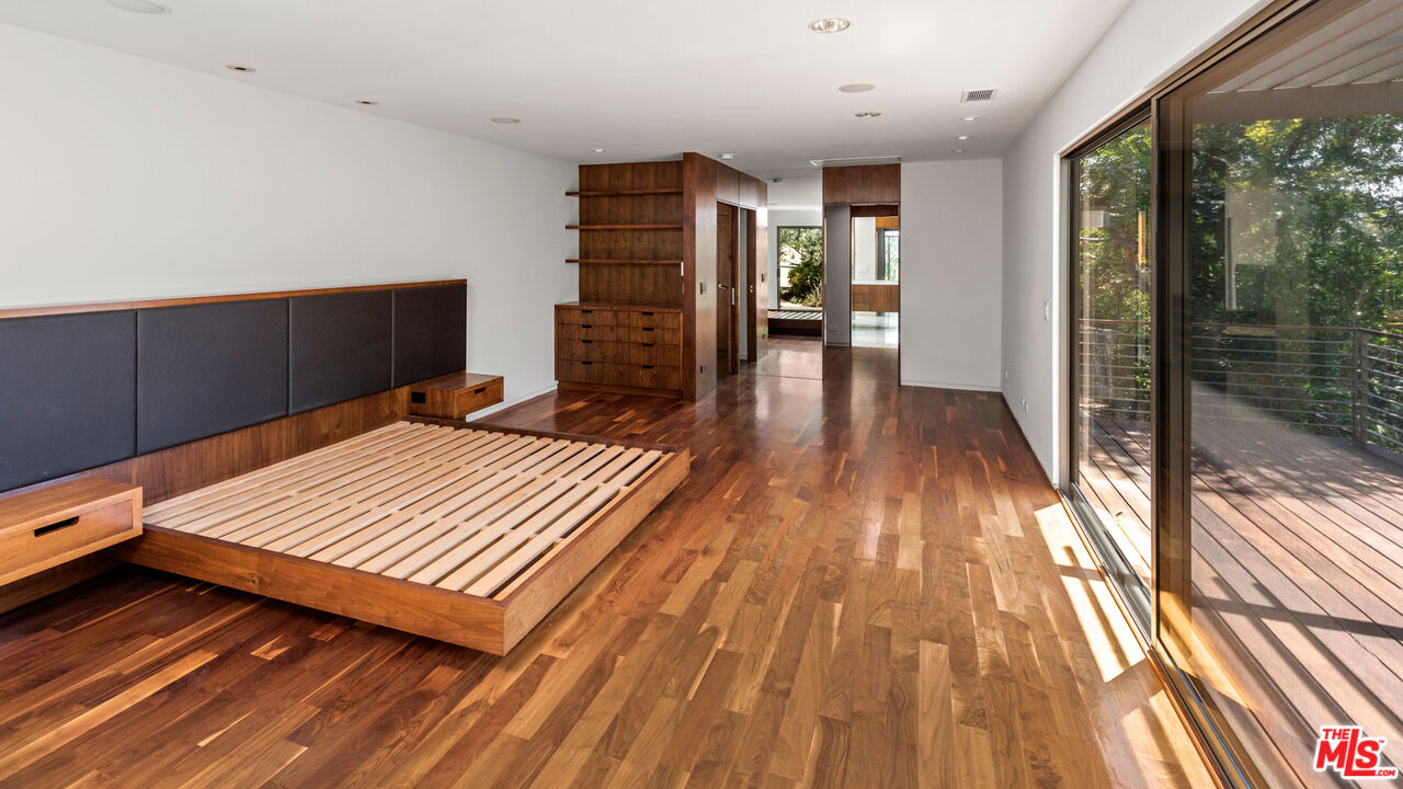 Undisclosed Address Los Angeles, CA 90068 - Photo 14 of 30 a view of a living room with wooden floor