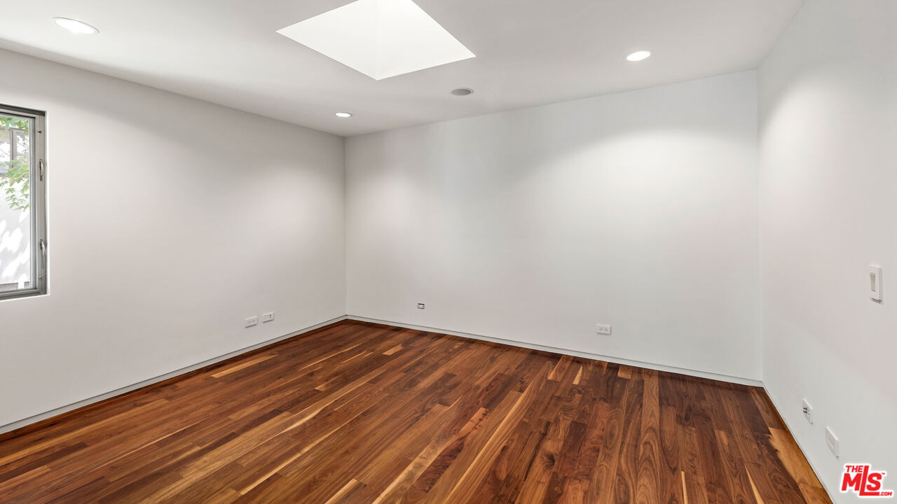 Undisclosed Address Los Angeles, CA 90068 - Photo 18 of 30 a view of room with wooden floor and fan