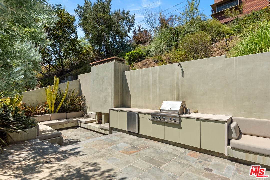 Undisclosed Address Los Angeles, CA 90068 - Photo 22 of 30 a view of a kitchen with a sink and sitting area