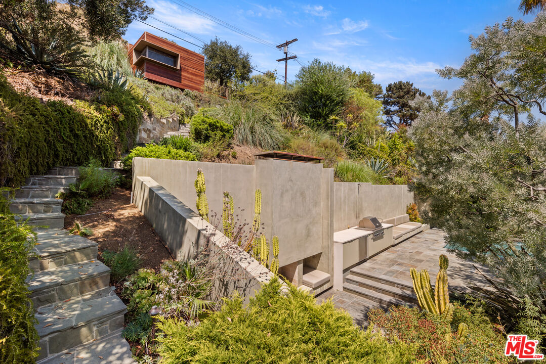 Undisclosed Address Los Angeles, CA 90068 - Photo 24 of 30 an aerial view of a house with yard and outdoor seating