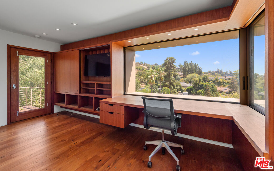 Undisclosed Address Los Angeles, CA 90068 - Photo 28 of 30 a view of a livingroom with furniture wooden floor and a window