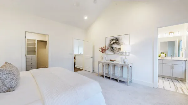 a bedroom with a bed and a cabinets