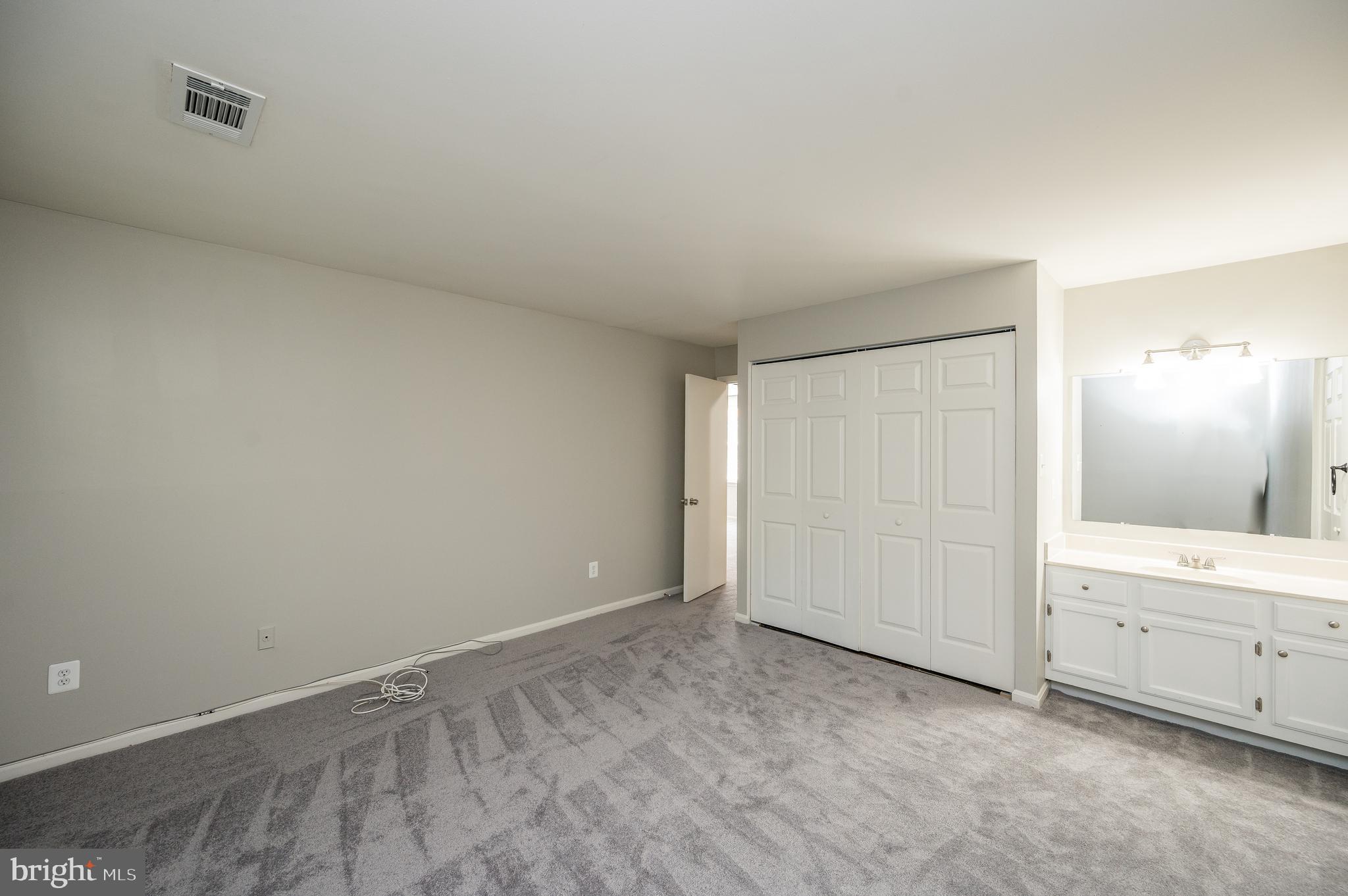 6128 Old Landing Way, Unit 75 Burke, VA 22015 - Photo 20 of 25 an empty room with a bathroom