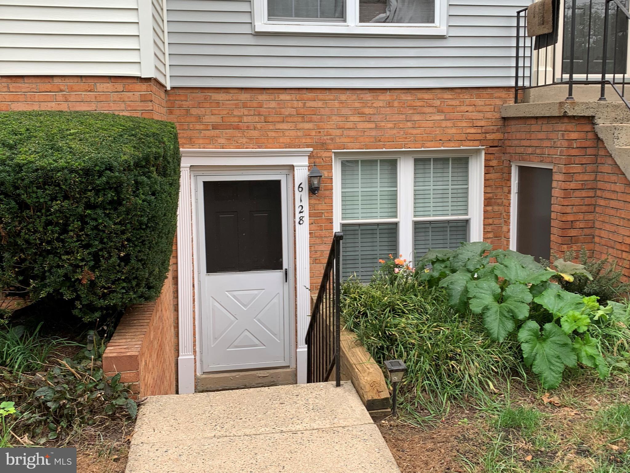 6128 Old Landing Way, Unit 75 Burke, VA 22015 - Photo 6 of 25 a front view of a house