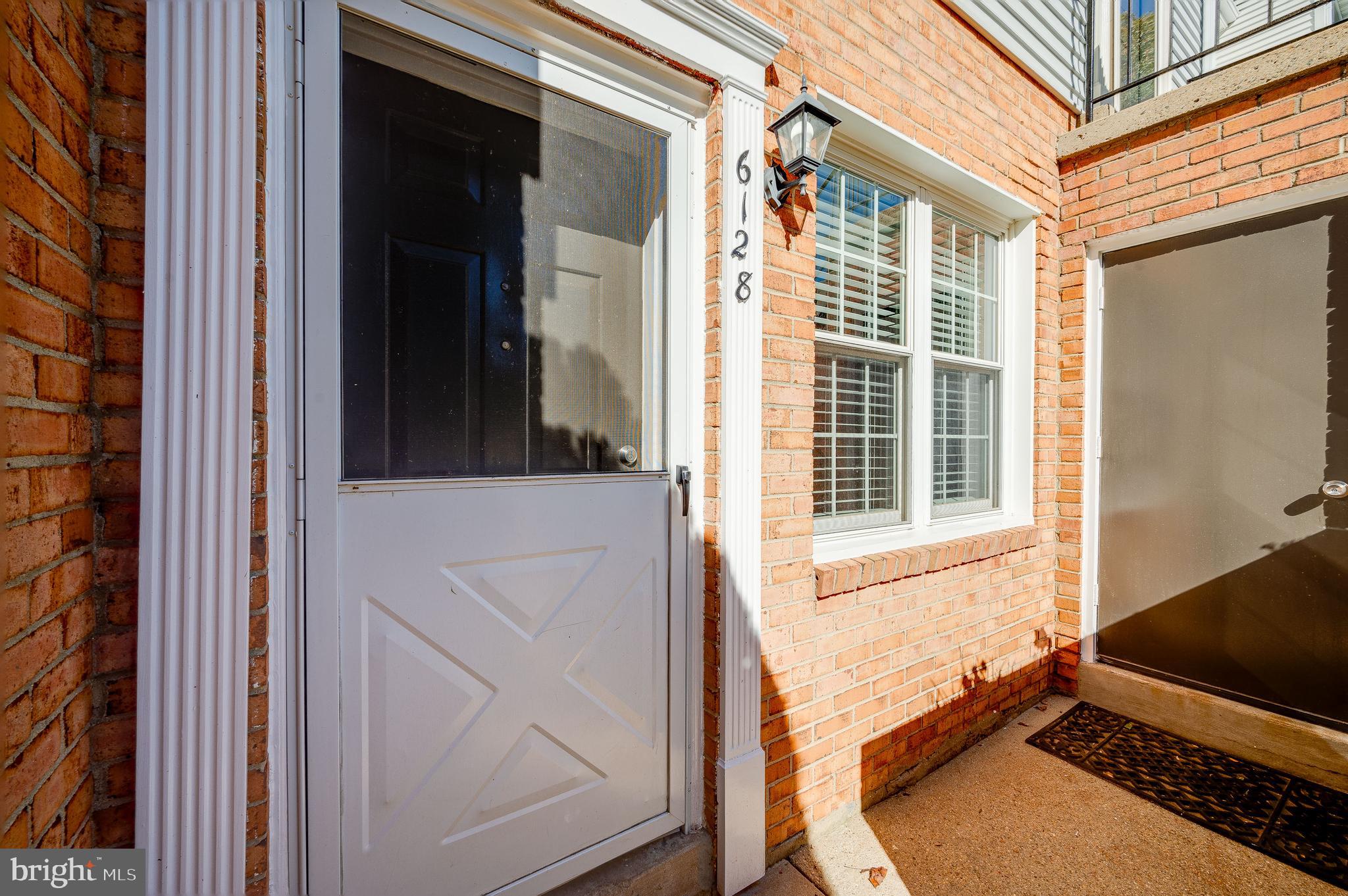 6128 Old Landing Way, Unit 75 Burke, VA 22015 - Photo 8 of 25 a view of an front door