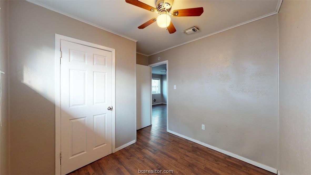 204 Lynn Drive, Unit B Bryan, TX 77801 - Photo 14 of 17 wooden floor in an empty room
