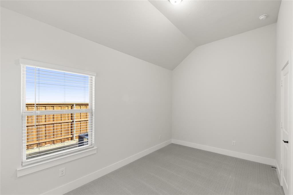 1503 Robinson Road Forney, TX 75126 - Photo 3 of 34 an empty room with a window