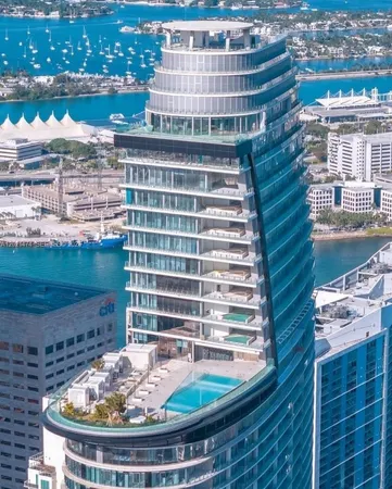 a view of a balcony with a lake and city view