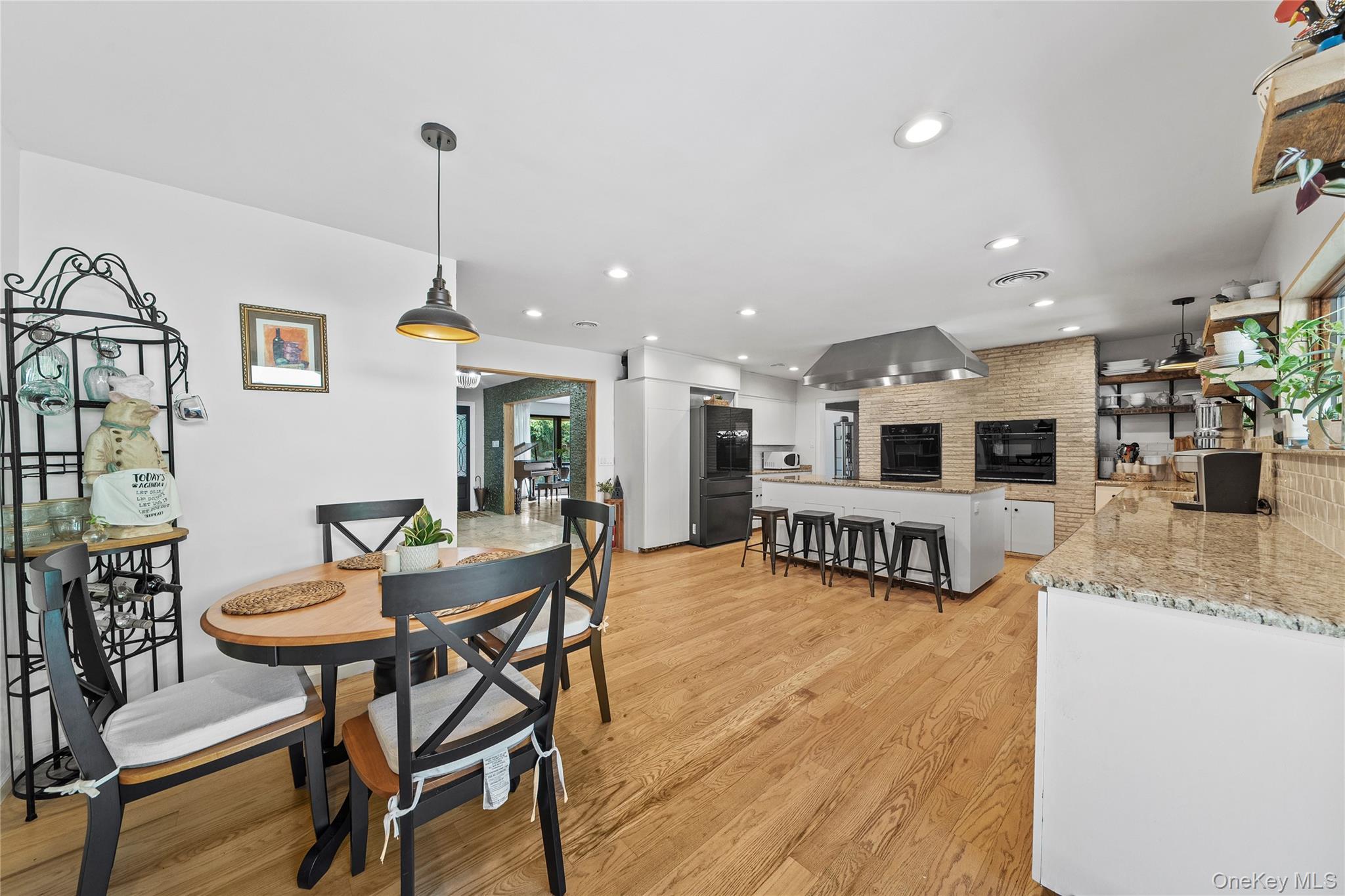 55 Rolling Hill Lane Old Westbury, NY 11568 - Photo 21 of 48 Dining area with light wood finished floors and recessed lighting