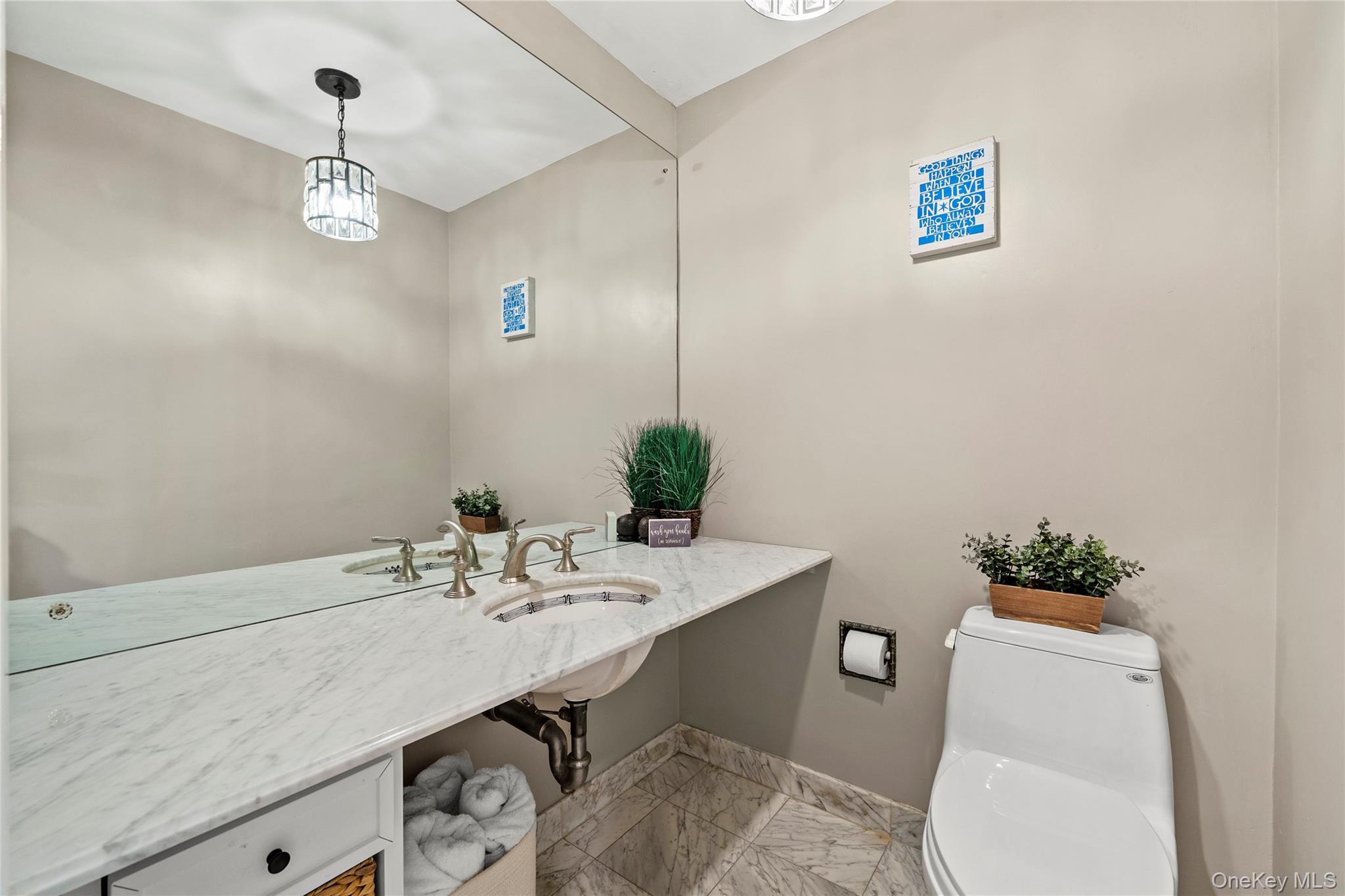 55 Rolling Hill Lane Old Westbury, NY 11568 - Photo 23 of 48 Half bathroom with toilet and light marble finish floors