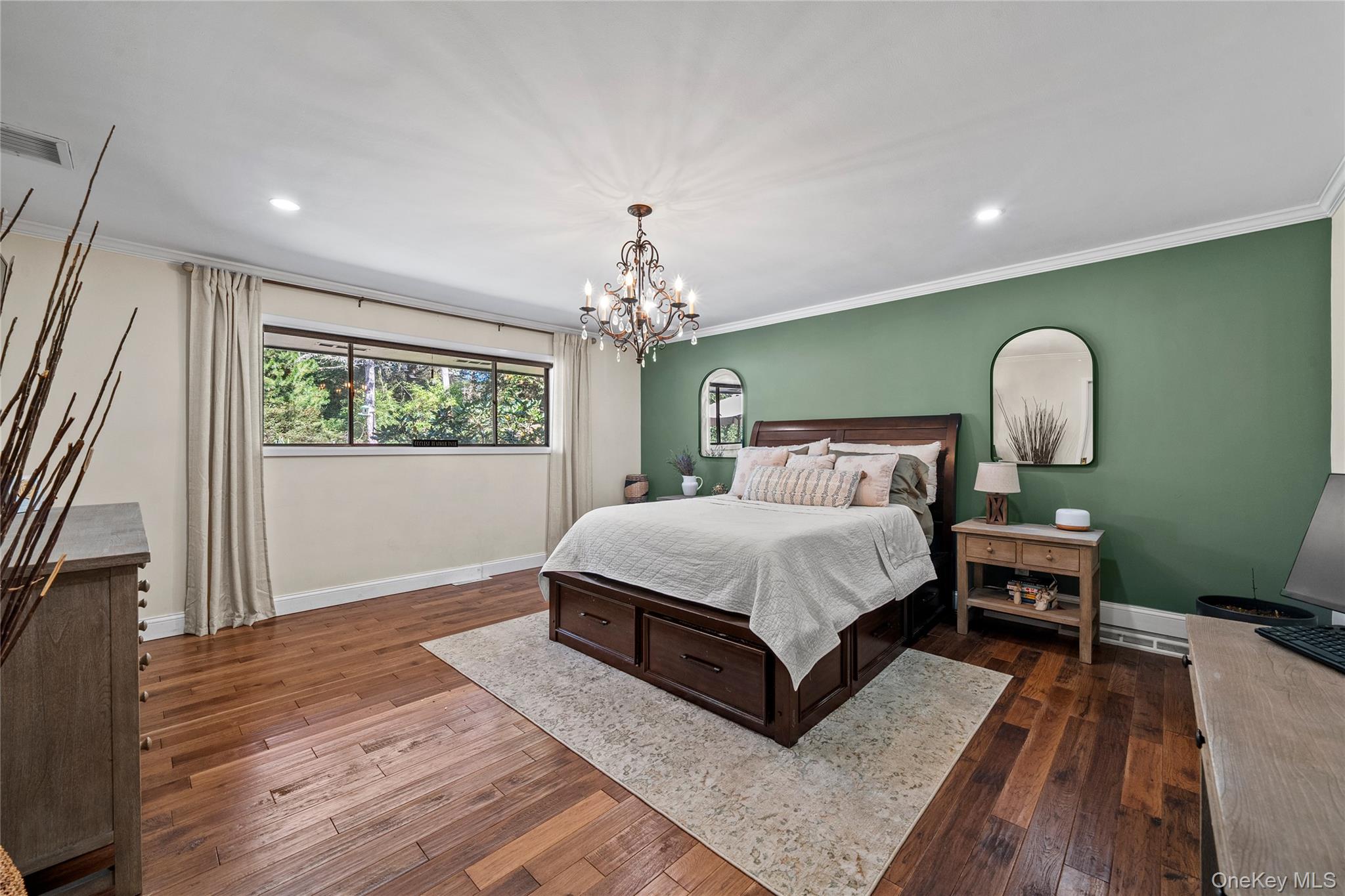55 Rolling Hill Lane Old Westbury, NY 11568 - Photo 24 of 48 Bedroom with crown molding, dark wood-type flooring, recessed lighting, and a chandelier