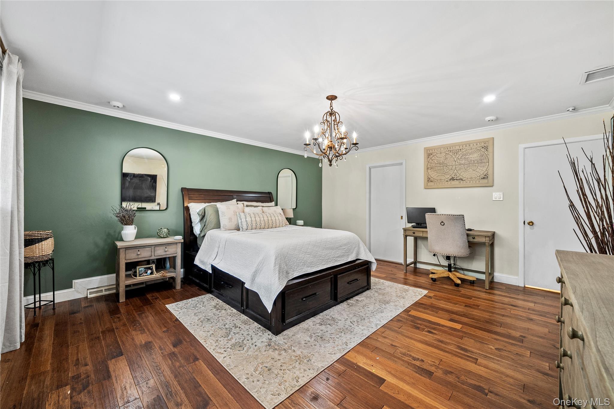 55 Rolling Hill Lane Old Westbury, NY 11568 - Photo 25 of 48 Bedroom featuring crown molding, dark wood-style floors, recessed lighting, an office area, and a chandelier