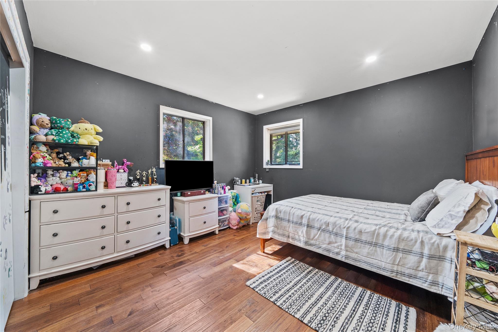 55 Rolling Hill Lane Old Westbury, NY 11568 - Photo 29 of 48 Bedroom featuring wood finished floors and recessed lighting