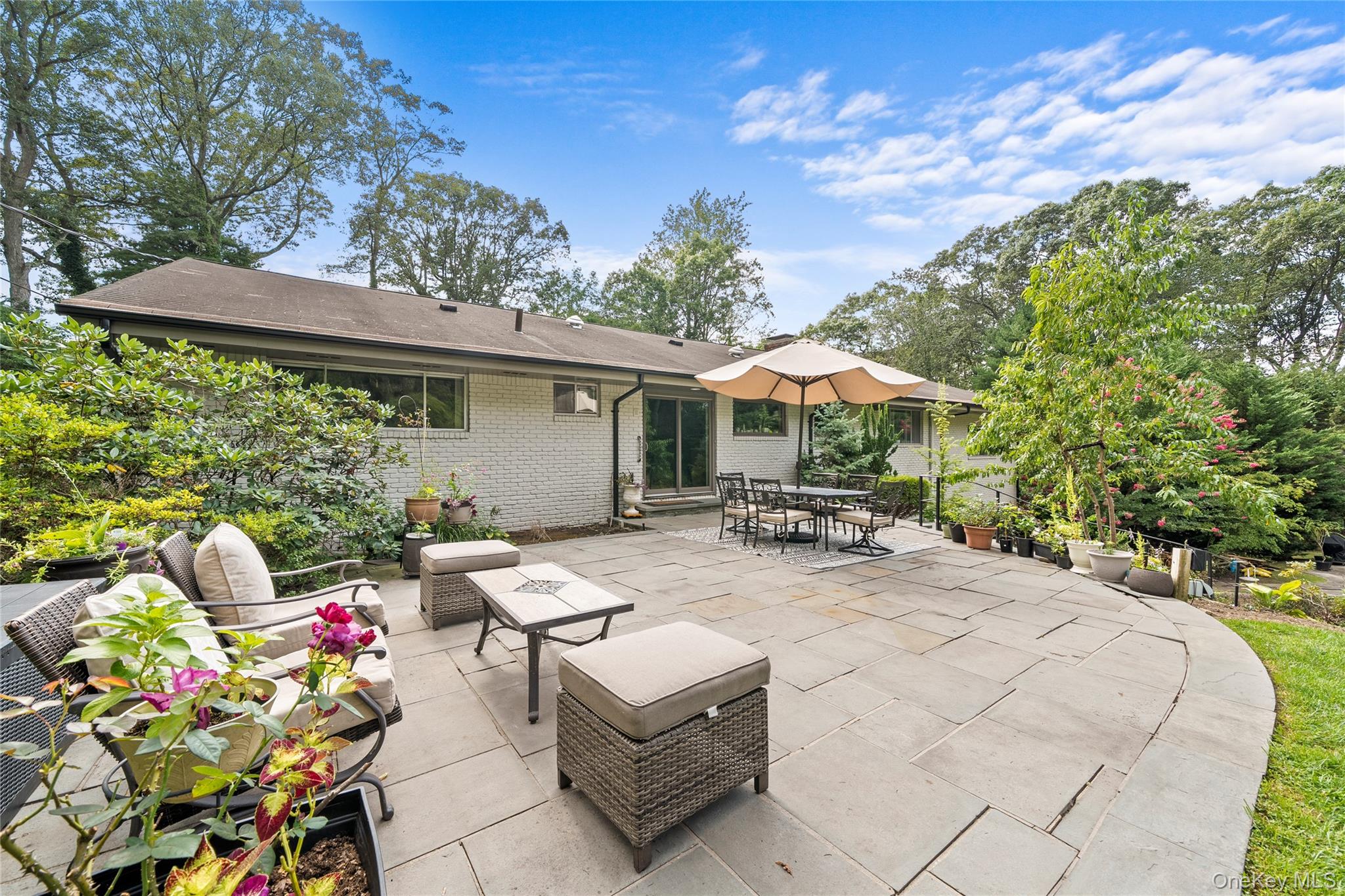 55 Rolling Hill Lane Old Westbury, NY 11568 - Photo 37 of 48 View of patio / terrace with outdoor dining space and an outdoor hangout area