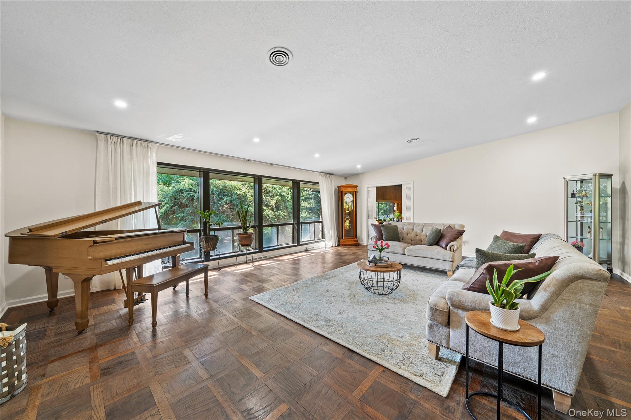 55 Rolling Hill Lane Old Westbury, NY 11568 - Photo 8 of 48 Living area with baseboards and recessed lighting