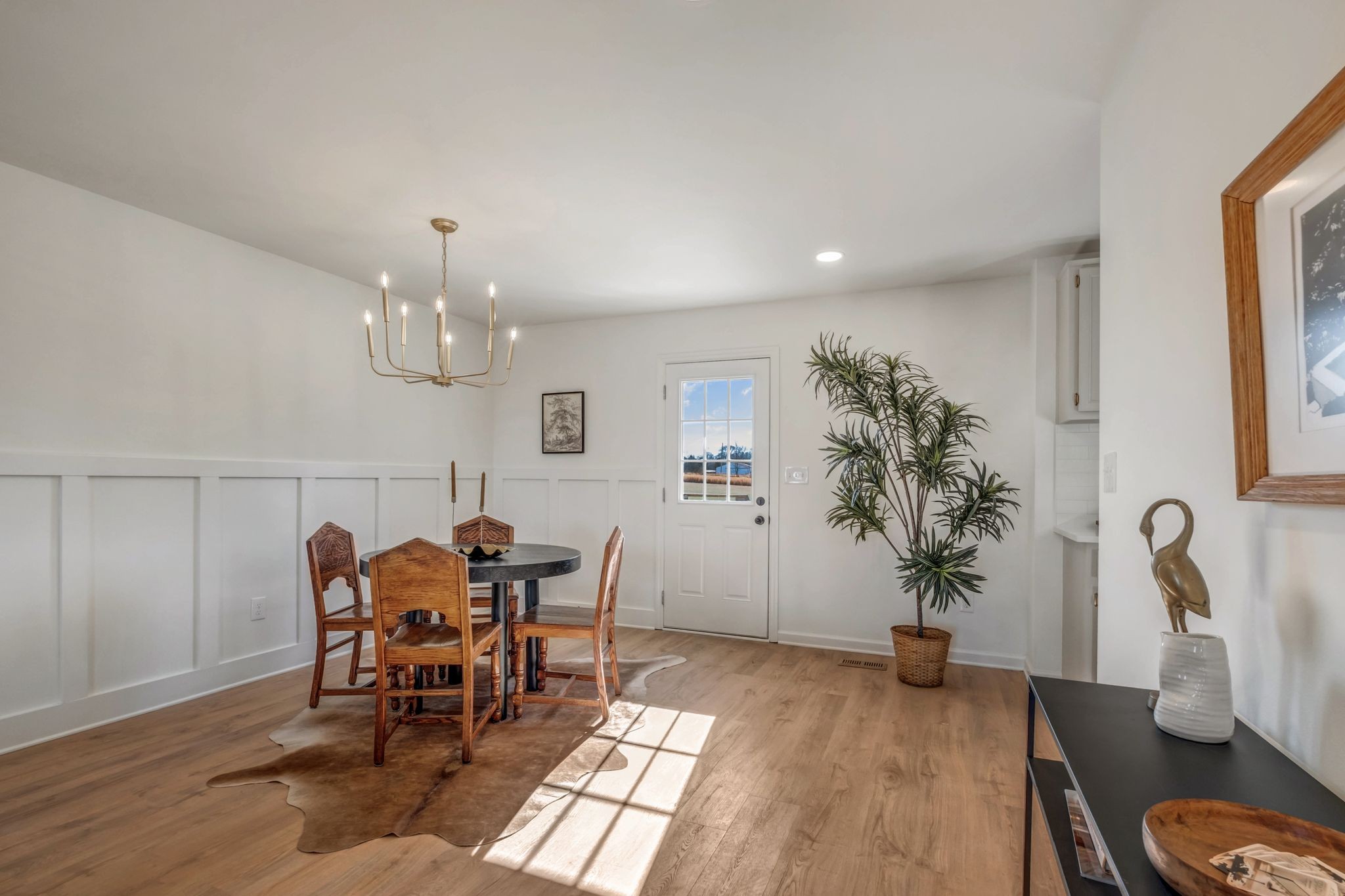 2308 Rogers Lane Lebanon, TN 37087 - Photo 14 of 36 a view of a dining room with furniture and wooden floor