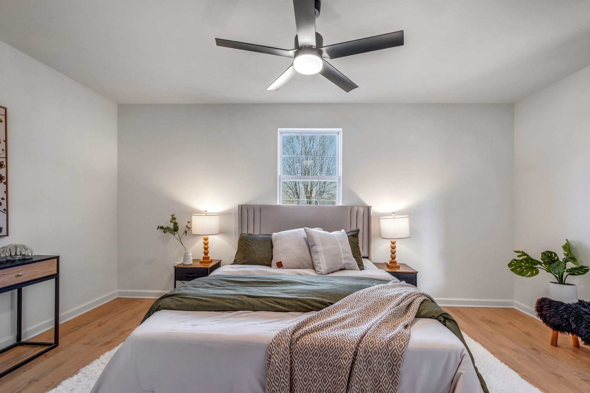 2308 Rogers Lane Lebanon, TN 37087 - Photo 21 of 36 a bedroom with bed and a chandelier