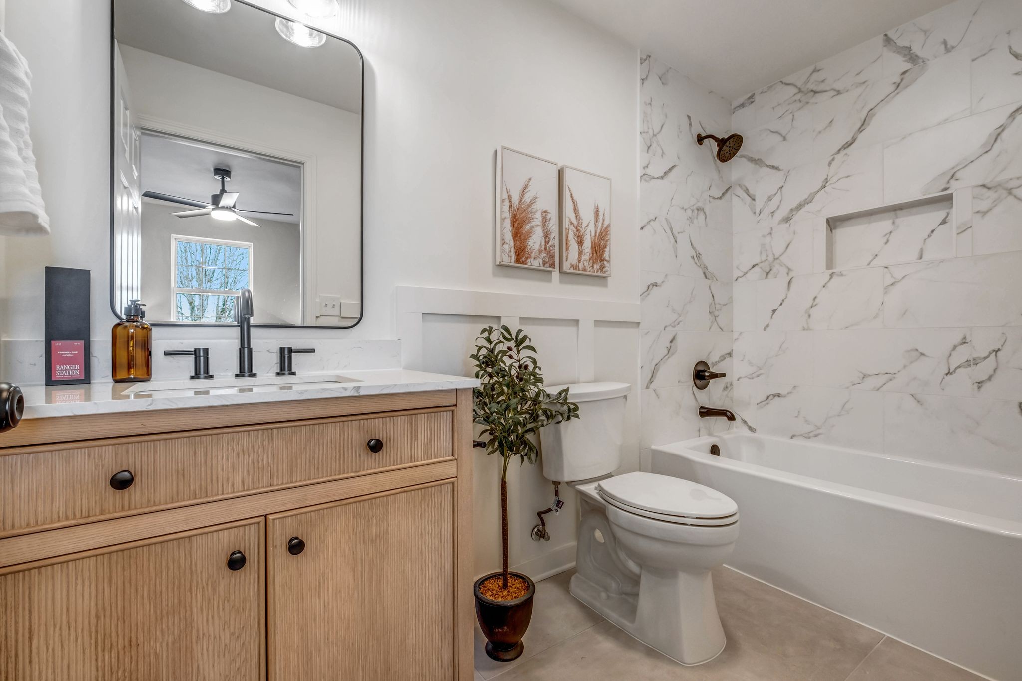 2308 Rogers Lane Lebanon, TN 37087 - Photo 22 of 36 a bathroom with a sink a toilet and a bathtub