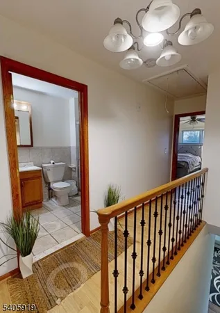 a view of a hallway with a couch