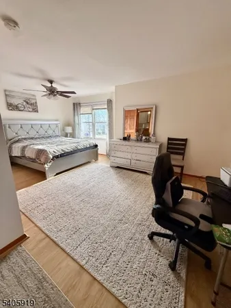 a bed room with a bed and a couch