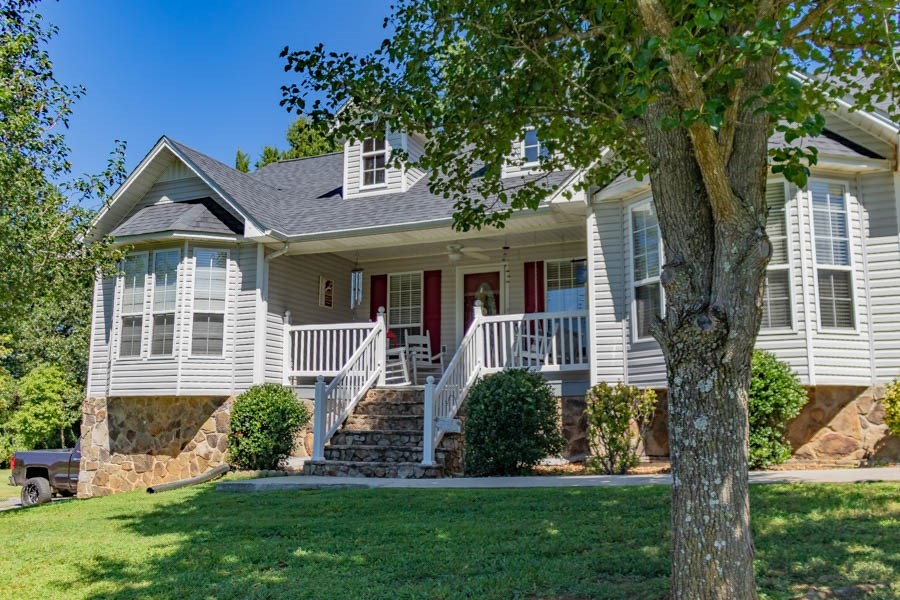 225 Robbies Lane Decatur, TN 37322 - Photo 4 of 43 front view of a house with a yard