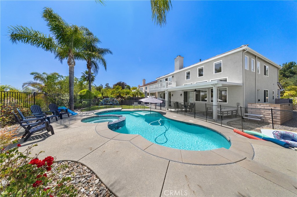 32985 Novara Court Temecula, CA 92592 - Photo 1 of 56 Resort-Style Backyard With Sparkling Pool, Spa, And Palm Tree Accents