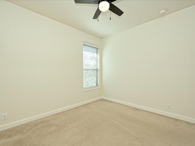 2101 Rivers Edge Way, Unit 29 Austin, TX 78741 - Photo 32 of 38 2nd level bedroom #3