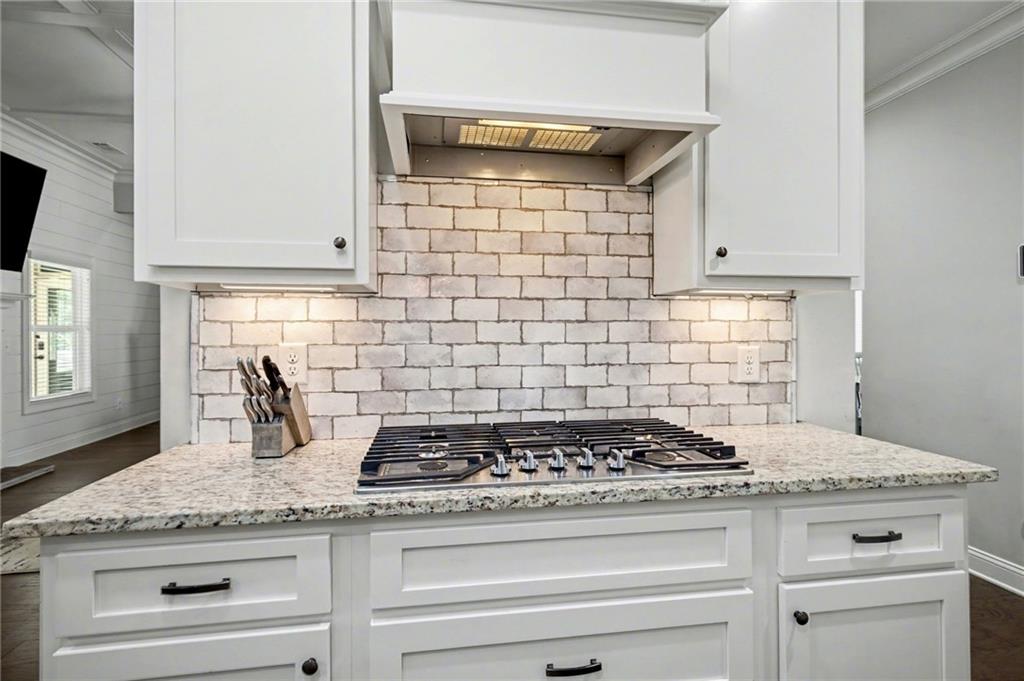 92 Gordon Oaks Way Moreland, GA 30259 - Photo 14 of 54 a stove top oven sitting inside of a kitchen