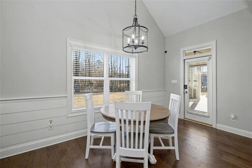 92 Gordon Oaks Way Moreland, GA 30259 - Photo 17 of 54 a view of a dining room with furniture window and wooden floor