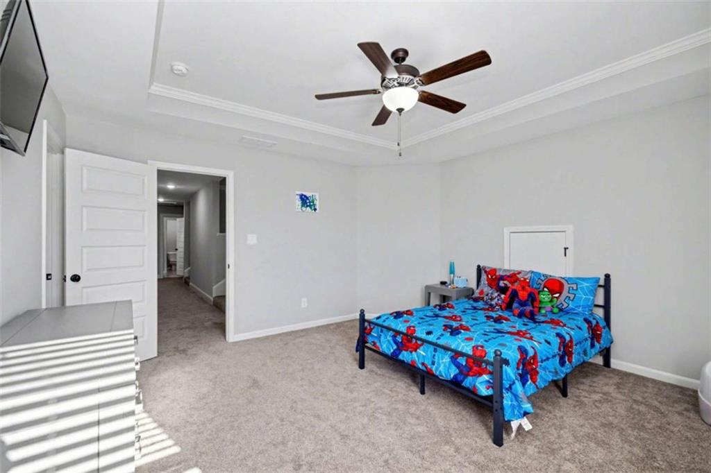 92 Gordon Oaks Way Moreland, GA 30259 - Photo 27 of 54 a living room with a bed furniture and a window
