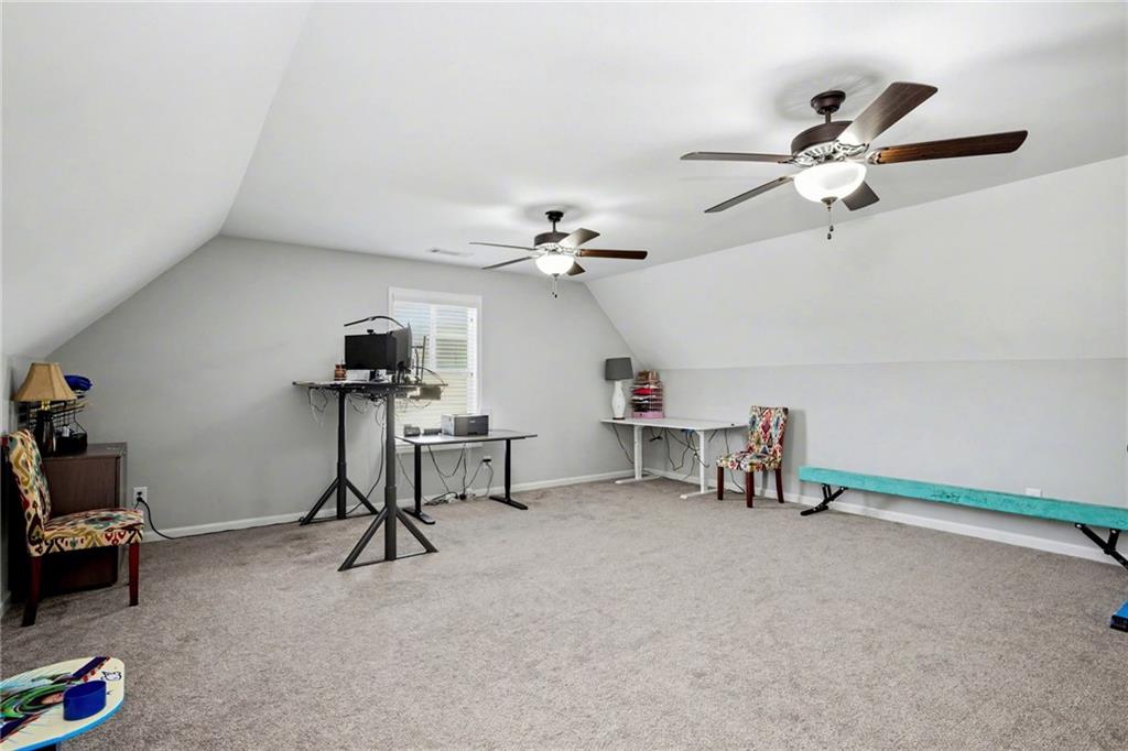 92 Gordon Oaks Way Moreland, GA 30259 - Photo 30 of 54 a view of a room with gym equipment